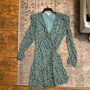 Deep V wrap dress with ruffled hemline with puff sleeves